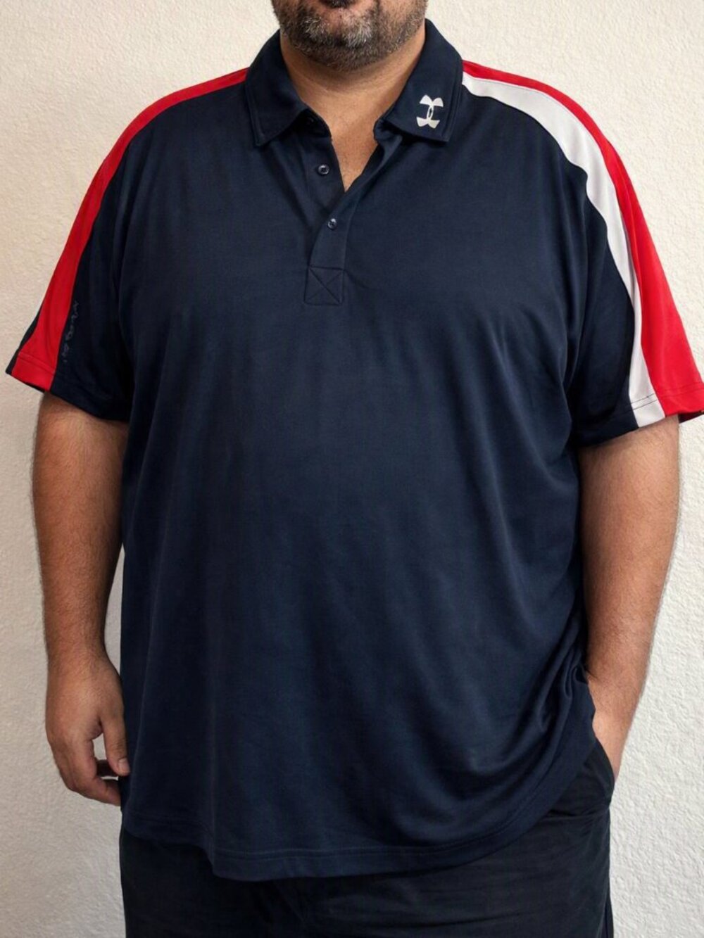 Under Armour Men’s Navy Blue Polo with Red and White Shoulder Stripes